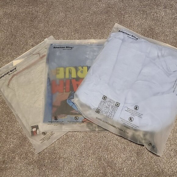 LOW PRICE Mystery bundle of 3 tshirts/blouses. Selling as is, as it's a mystery - Picture 1 of 2